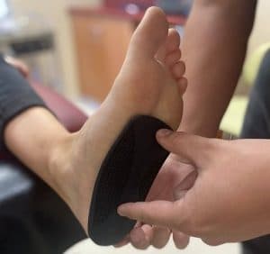 Foot Orthotic Up Against Foot