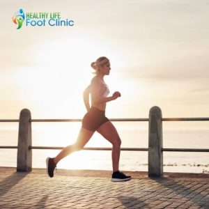 Lady Running Along the Beach at Sunset